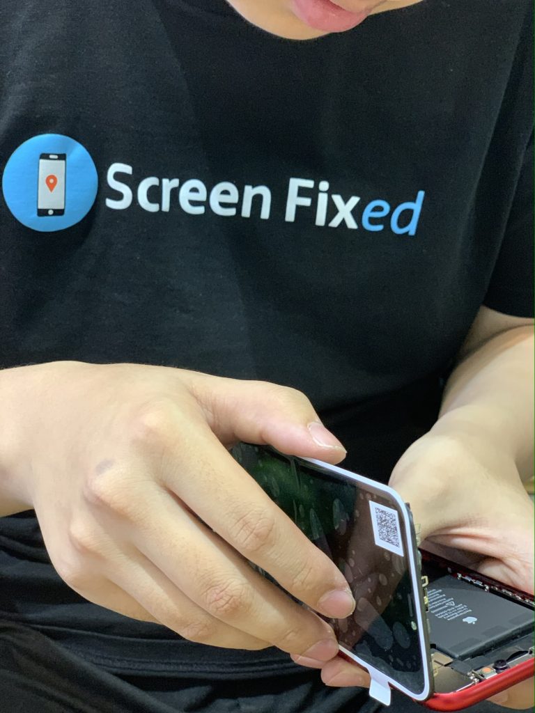 Screen Fixed technician repairing iphone 11