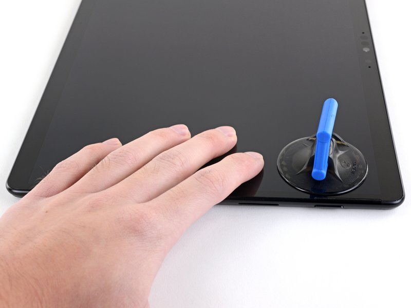 Step #9. Secure The Tablet With Your Hands